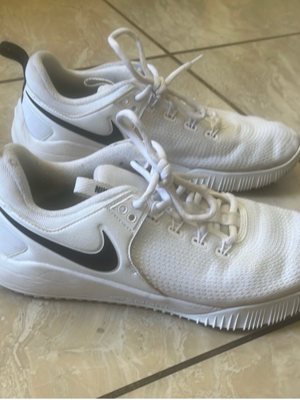 Nike White Sneakers with Black Swoosh